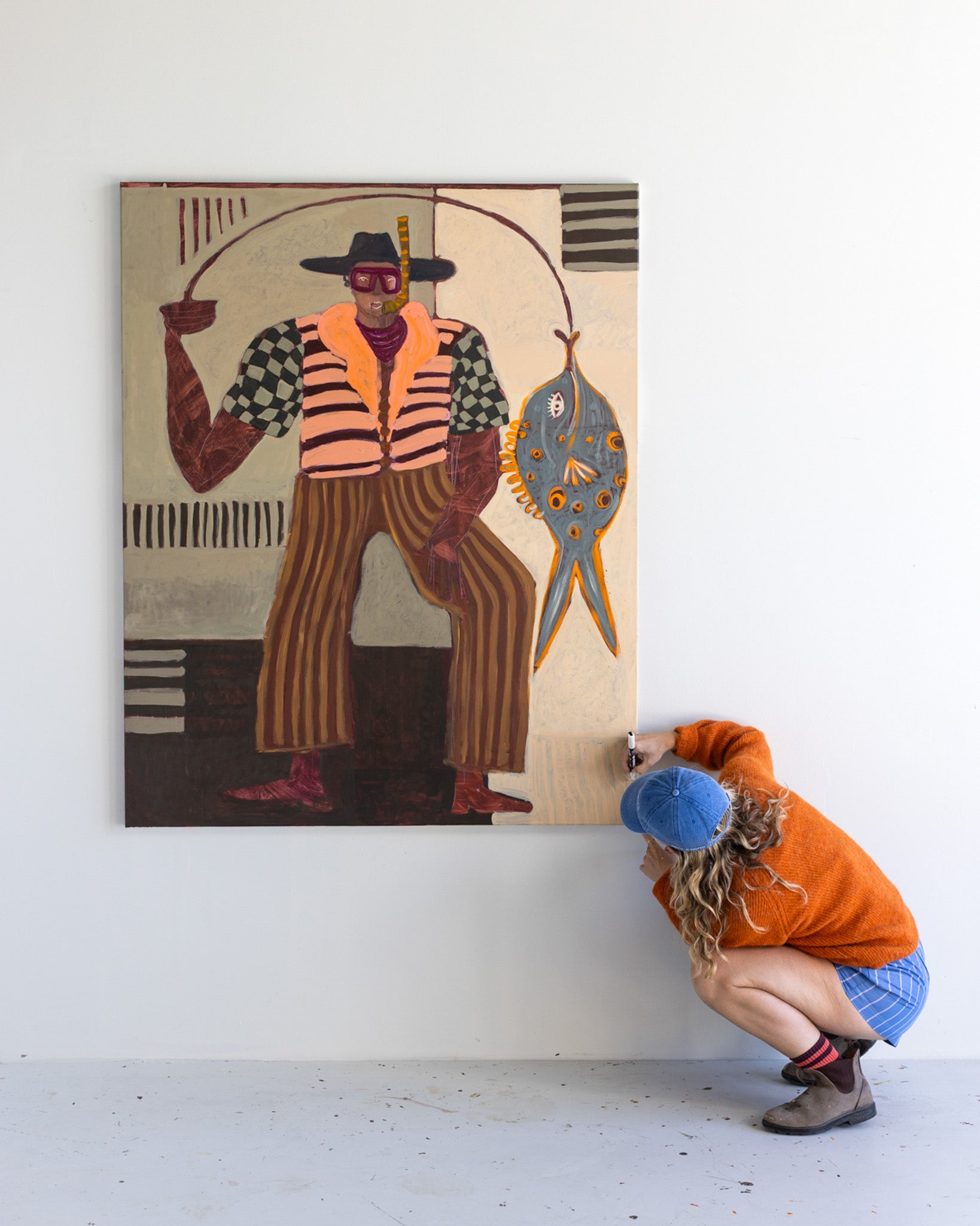 Large original canvas painting of a fisherman with a large fish. Acrylic paint with a very vibrant and playful palette.